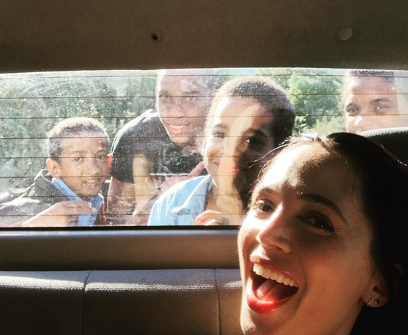 Eliza Dushku: The little boy in blue up front jumped in our truck & stole my heart today! #DominicanRepublic